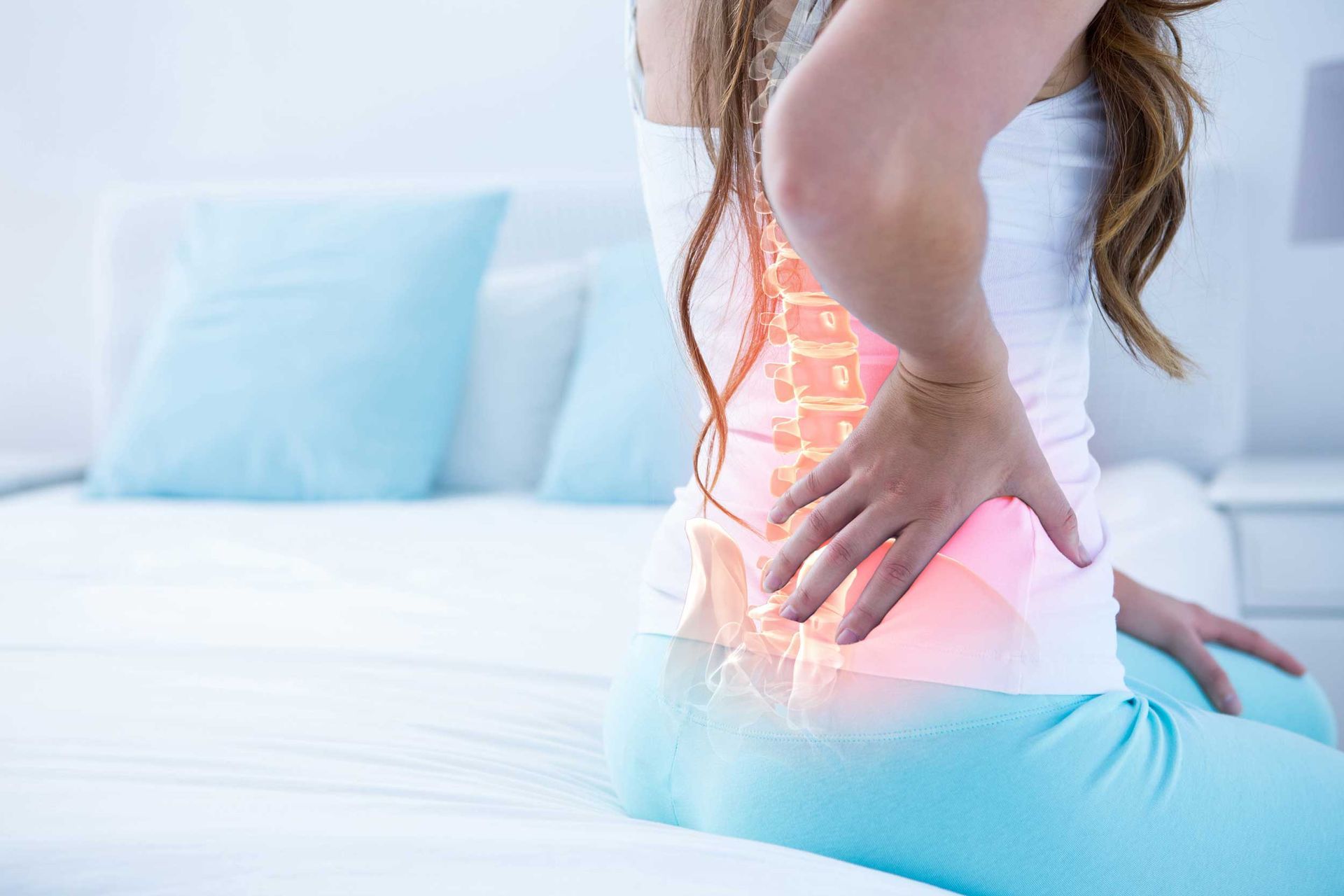 A digital composite of the highlighted spine of a woman with back pain.